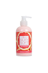 Silky Soft Pink Grapefruit Hand & Body Lotion with a vibrant pink grapefruit fragrance in an 8 oz bottle.