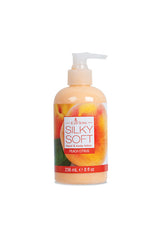 Silky Soft Peach Citrus Hand & Body Lotion with a refreshing peach scent in an 8 oz bottle.