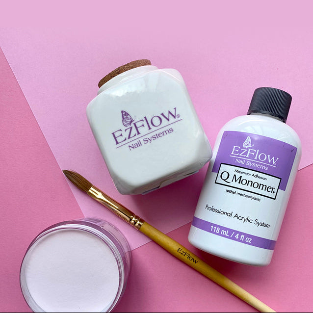 Two bottles of EZFlow nail system products on a pink background